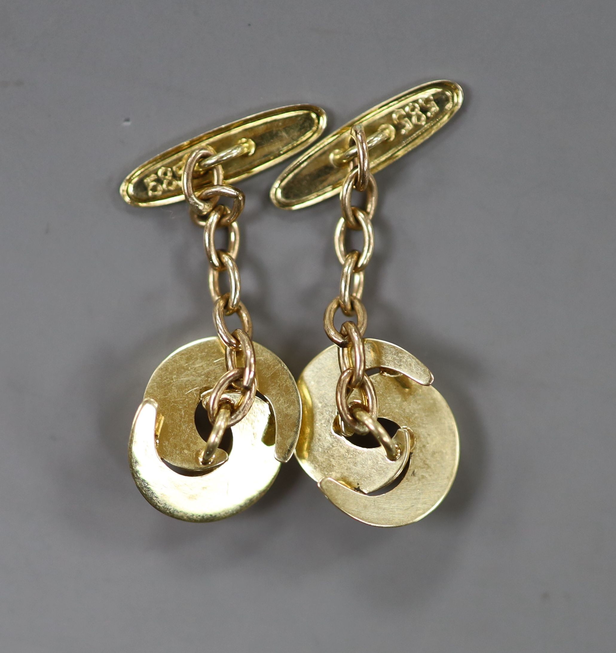 A modern pair of two colour yellow metal (stamped 585) knot cufflinks, 12mm, 4 grams.